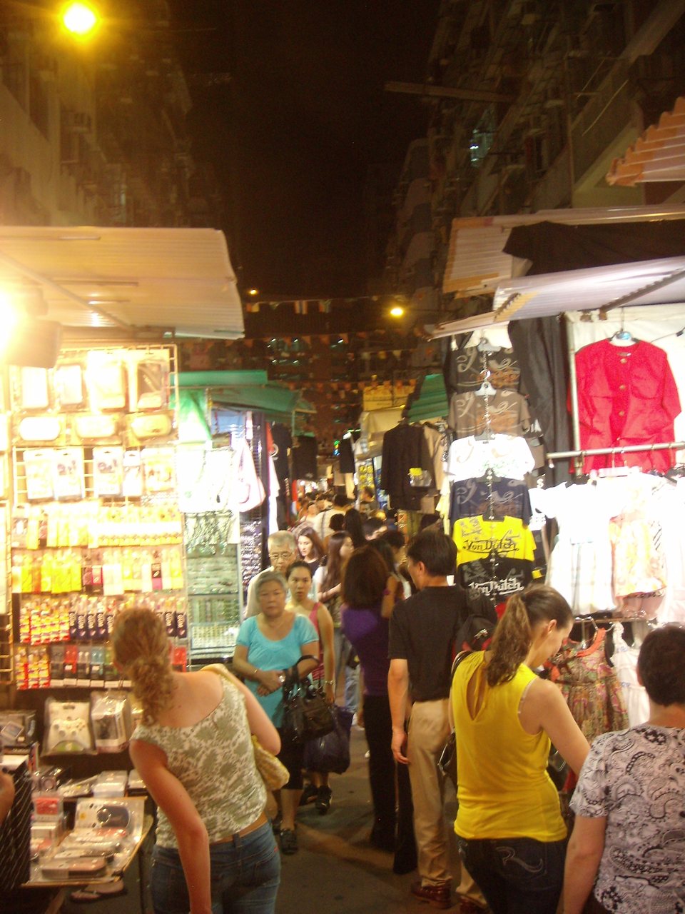 The Temple Night Market is a popular tourist attraction on the Kowloon peninsula and is open until midnight.