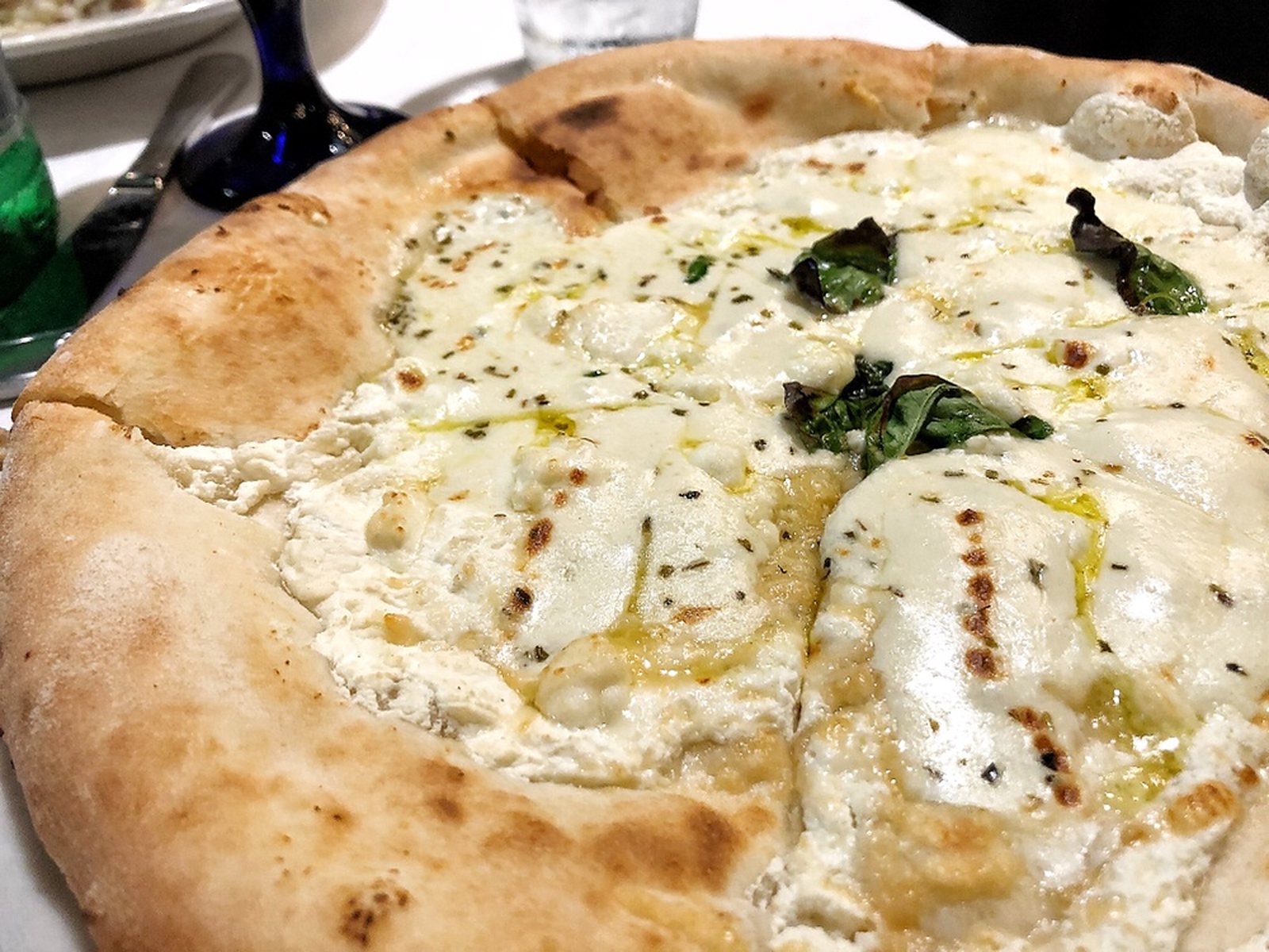 Quattro formaggio (four cheese) pizza is cheesy bliss.
