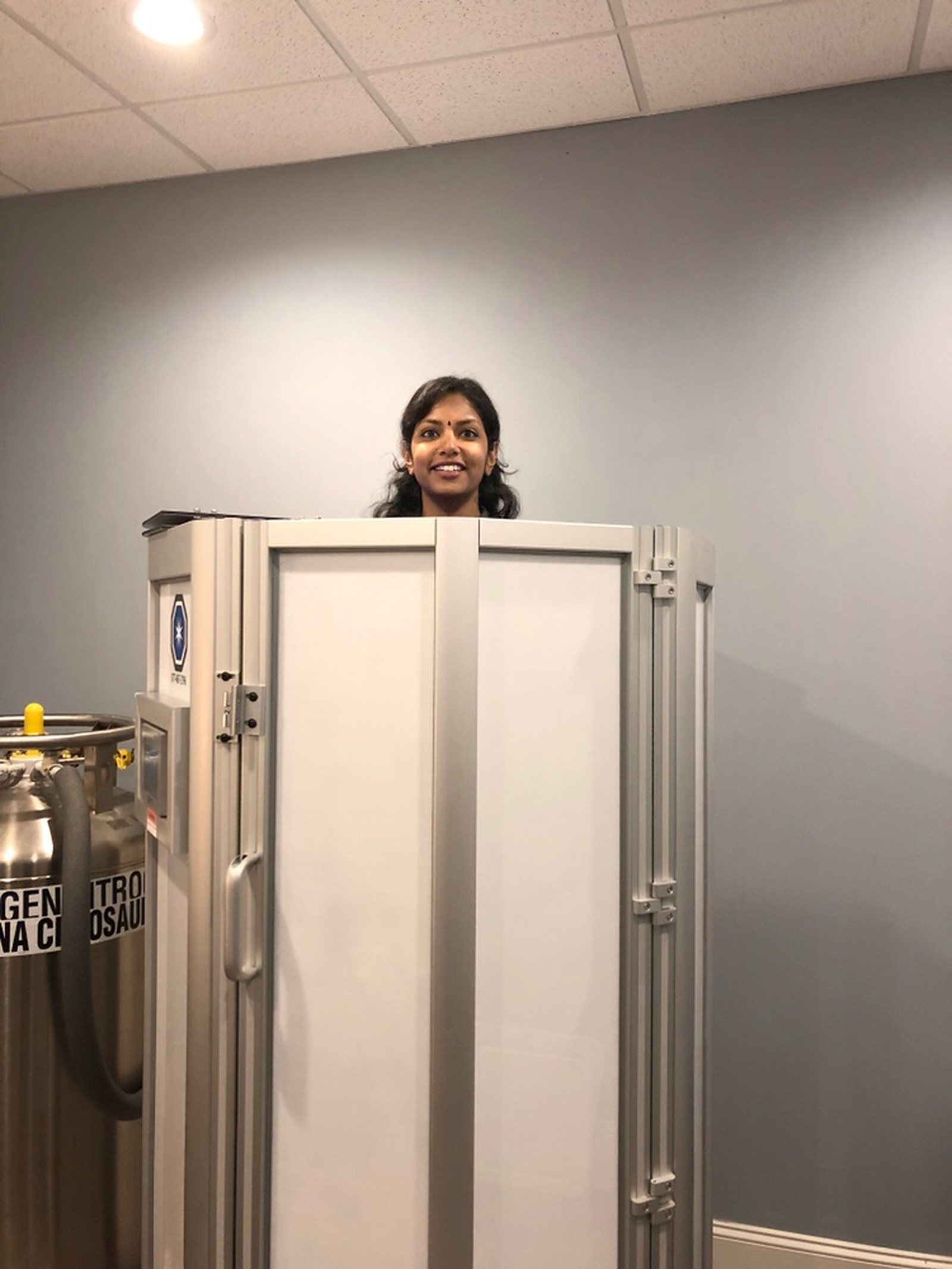 Standing in the cryotherapy chamber.