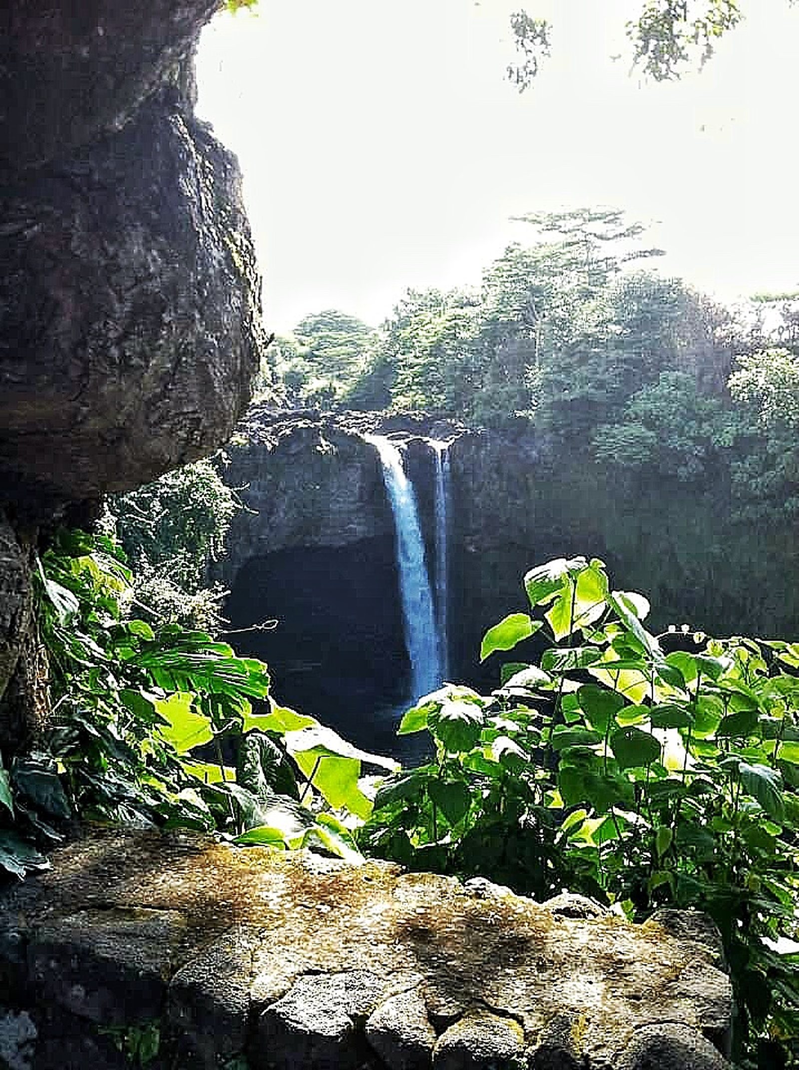Rainbow Falls Big Island Hawaii,lava rock in Hawaii, Big Island of Hawaii things to do, ultimate guide to Big Island Hawaii, what to see in Big Island, Hawaiian island itineraries, guide to Big Island Hawaii, five-day Big Island itinerary, five-day guide to Big Island Hawaii, waterfalls in Hawaii, waterfalls in Big Island Hawaii