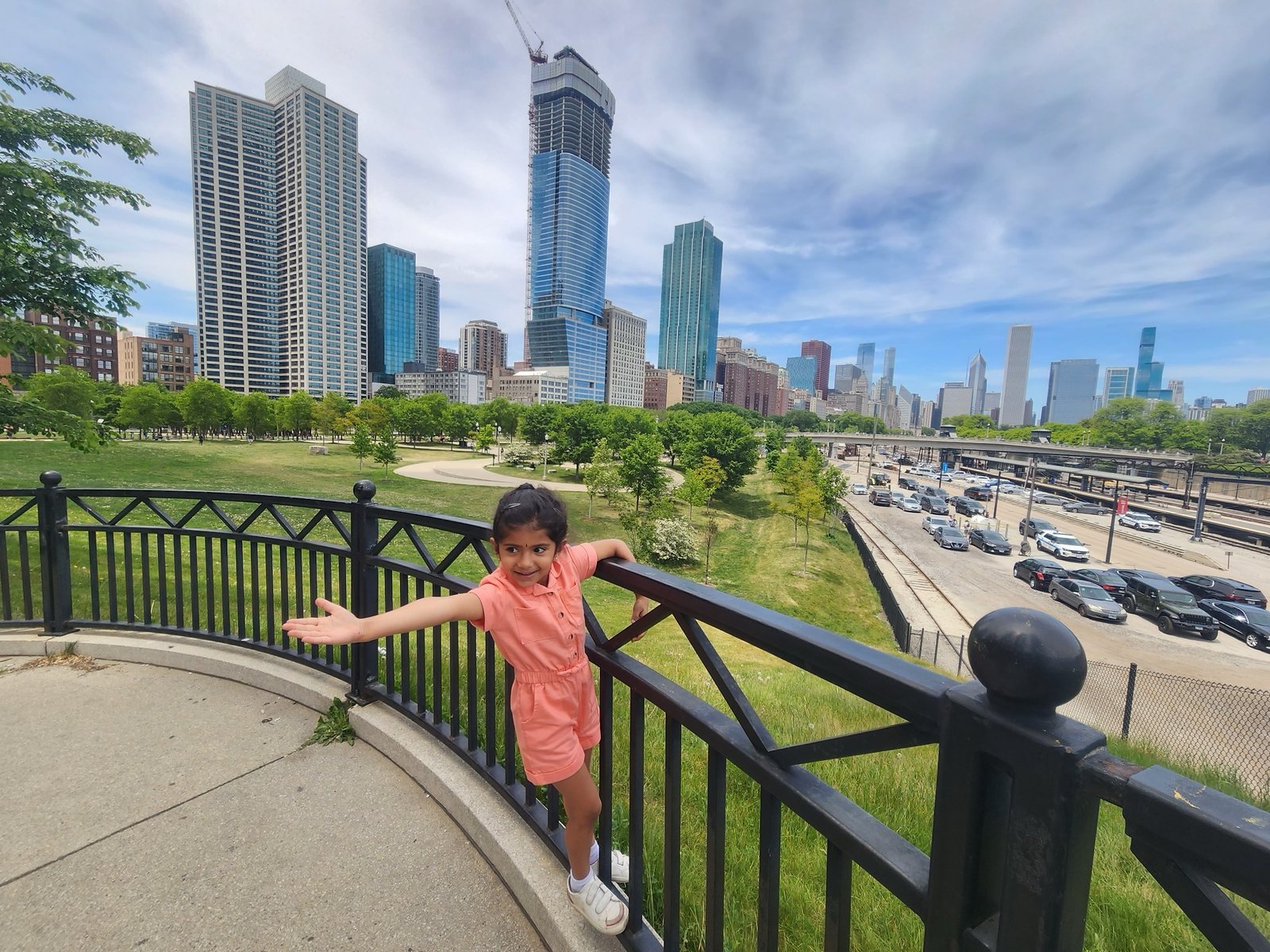 Child showing the buildings of Chicago